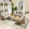 A patio set with sofas and tables on a patio. Produktbild-Vorschau