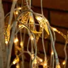 Close-up of illuminated branches with leaf-shaped lights. Podgląd zdjęcia produktu