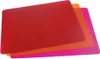 Three flexible cutting mats are stacked on top of each other. Voir les images du produit