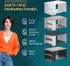 A woman is shown on the left, smiling and wearing an orange cardigan. On the right, four variations of a white coffee table with different colored tops and shelves are displayed, each with a corresponding text label and icon. Produktbild-Vorschau
