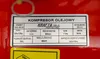 A close-up of a label on a red compressor. Náhľad obrázku produktu