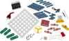 A collection of electronic components for an experiment kit, laid out on a white background. Anteprima dell’immagine prodotto