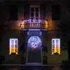 A house facade at night decorated with string lights. Náhled obrázku produktu