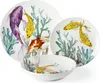 A set of porcelain dishes with a koi fish and coral design. Podgląd zdjęcia produktu