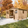 A wooden garden shed with its door open, set in a garden during autumn with colorful trees in the background. Various garden items are placed around the shed. Produktbild-Vorschau