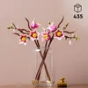 Äste mit Magonolien Blüten Produktbild-Vorschau 3