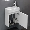 A modern white bathroom vanity with an open cabinet displaying toiletries. Voir les images du produit