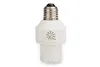 A white lamp adapter with a timer dial is shown against a white background. Produktbild-Vorschau