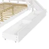 A close-up view of the bottom section of a white bunk bed, showing two open drawers with wheels. Anteprima dell’immagine prodotto