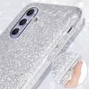 A close-up of a silver glitter phone case on a Samsung Galaxy A54 5G, with a hand pressing the side buttons. Produktbild-Vorschau
