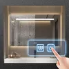 A hand is shown touching a smart mirror with integrated lighting and touch controls, likely in a bathroom setting. Produktbild-Vorschau