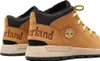 A close-up view of the back and side of two brown Timberland Sprint Trekker Mid hiking boots. Produktbild-Vorschau