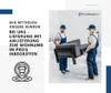Two men in blue overalls carrying a sofa. Produktbild-Vorschau