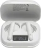 A pair of white wireless earbuds in their charging case, with a digital display showing battery percentage. Náhled obrázku produktu