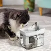 A cat drinks water from a pet fountain. Produktbild-Vorschau