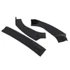 Three black automotive body kit parts laid out on a white background. Náhled obrázku produktu