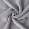 A close-up, swirled view of a soft, gray fabric. Produktbild-Vorschau