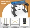 A product image showcasing a black L-shaped desk with blue LED lighting, featuring multiple shelves and close-up details of its construction. Produktbild-Vorschau