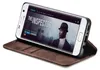 A smartphone in a brown flip case, displaying a movie poster on its screen. Produktbild-Vorschau