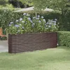 A raised garden bed filled with hydrangeas sits on a lawn next to a patio with a chair and umbrella. Podgląd zdjęcia produktu