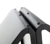 A close-up view of two black metal structures, possibly part of a fireplace log rack, joined by screws. Produktbild-Vorschau