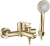 A gold-colored bathtub faucet and showerhead are shown against a white background. Produktbild-Vorschau