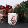 Weiße festliche Porzellantasse, Weihnachtsmann auf Skiern Produktbild-Vorschau 4
