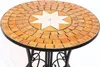 A round mosaic table with a star pattern in the center, set against a white background. Produktbild-Vorschau