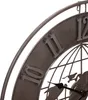 A close-up view of a decorative wall clock with a globe motif. Produktbild-Vorschau