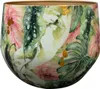 A close-up view of a decorative pot with a tropical leaf pattern. Produktbild-Vorschau