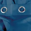 A close-up view of a blue curtain with grommets. Anteprima dell’immagine prodotto