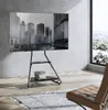 A modern living room with a TV stand and a chair. Produktbild-Vorschau
