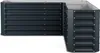 An L-shaped raised garden bed made of dark gray corrugated metal, shown from a slightly elevated angle against a white background. Náhľad obrázku produktu