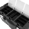 A close-up view of an open black toolbox with multiple compartments and clear plastic lids. Náhľad obrázku produktu