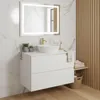 A modern bathroom vanity with a sink and mirror. Produktbild-Vorschau