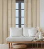 A living room scene with a sofa and curtains. Produktbild-Vorschau