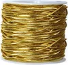 A spool of gold elastic cord. Produktbild-Vorschau