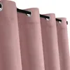 A close-up view of several pink velvet curtains hanging from a black curtain rod. Podgląd zdjęcia produktu