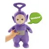 A purple Teletubby toy is being held by a child's hand, with a speech bubble saying 'HOORAY!'. Produktbild-Vorschau
