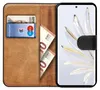 A book-style phone case with cards and cash inside, next to a smartphone. Produktbild-Vorschau