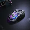 A futuristic gaming mouse with internal lighting sits on a textured dark surface, with another similar object in the background. Produktbild-Vorschau
