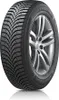 A close-up studio shot of a Hankook Winter i*Cept Rs2 tire mounted on a silver alloy wheel, presented against a white background. Produktbild-Vorschau