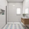 A modern bathroom with a walk-in shower, vanity, and tiled floor. Produktbild-Vorschau