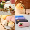 A collage of four images showing various felt craft items, including small animal figures, coin purses, and hair clips, along with raw felt materials. Produktbild-Vorschau