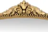 A close-up of the ornate gold frame of a mirror. Anteprima dell’immagine prodotto