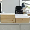 Two wooden boxes are placed on a white surface in front of a desk. Náhľad obrázku produktu