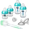 A collection of baby bottles and accessories arranged on a white background. Anteprima dell’immagine prodotto