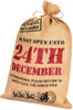 A burlap sack with Christmas-themed text and graphics. Produktbild-Vorschau