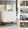 A collage of images showing a white sideboard in different room settings: an entryway, a living room, a dining room, and a bedroom. Produktbild-Vorschau