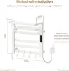 Diagram showing dimensions and installation information for a towel warmer. Anteprima dell’immagine prodotto